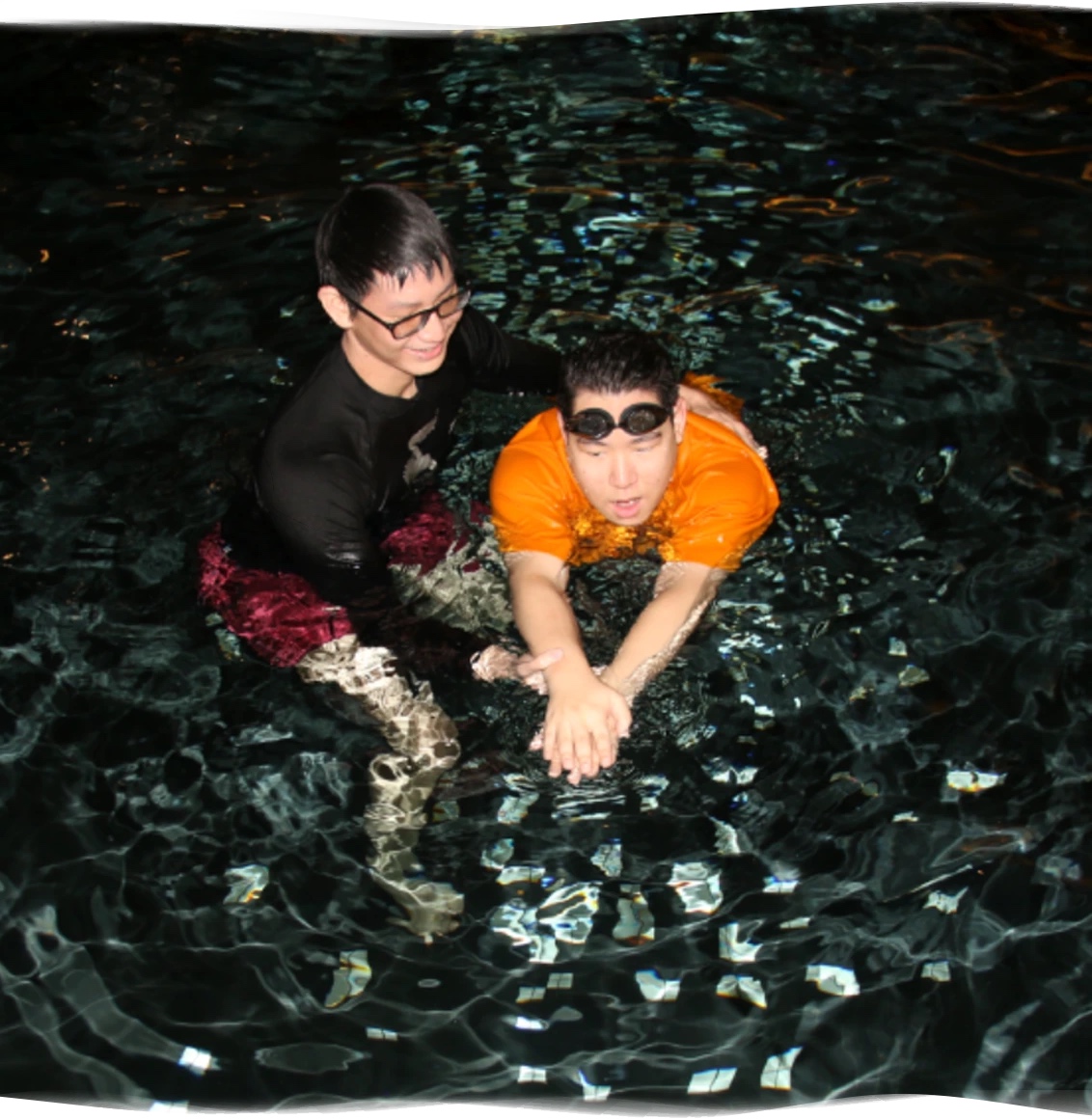 Nereids swim teacher supporting adult confidence private swimming lesson 