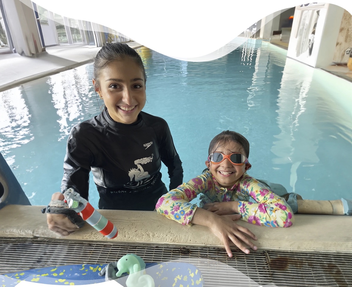Nereids teacher student smiling after her private swimming lesson
