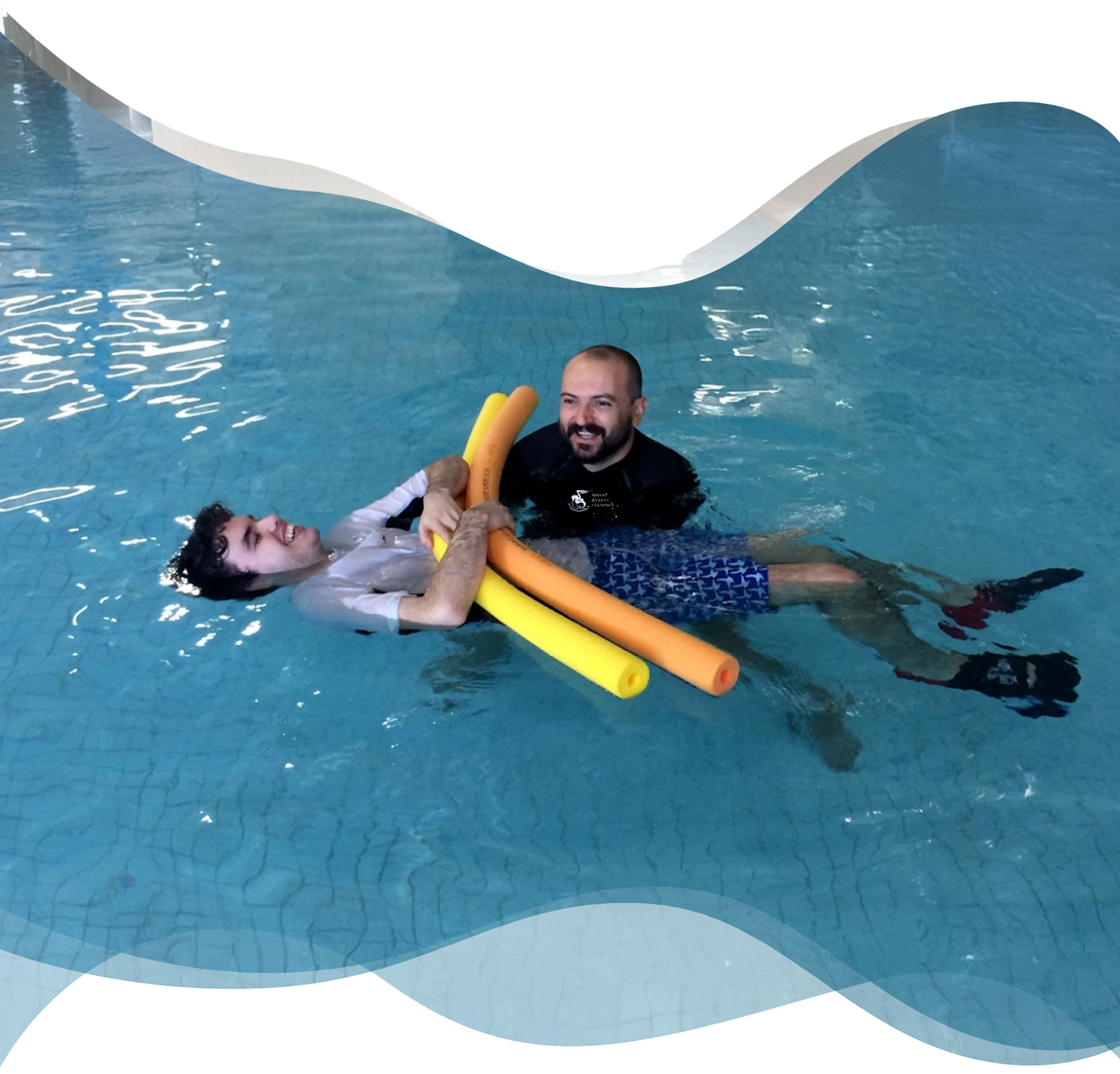 Adult student floating on his back with support from a Nereids swim teacher, both joyful during a private water confidence swimming lesson.