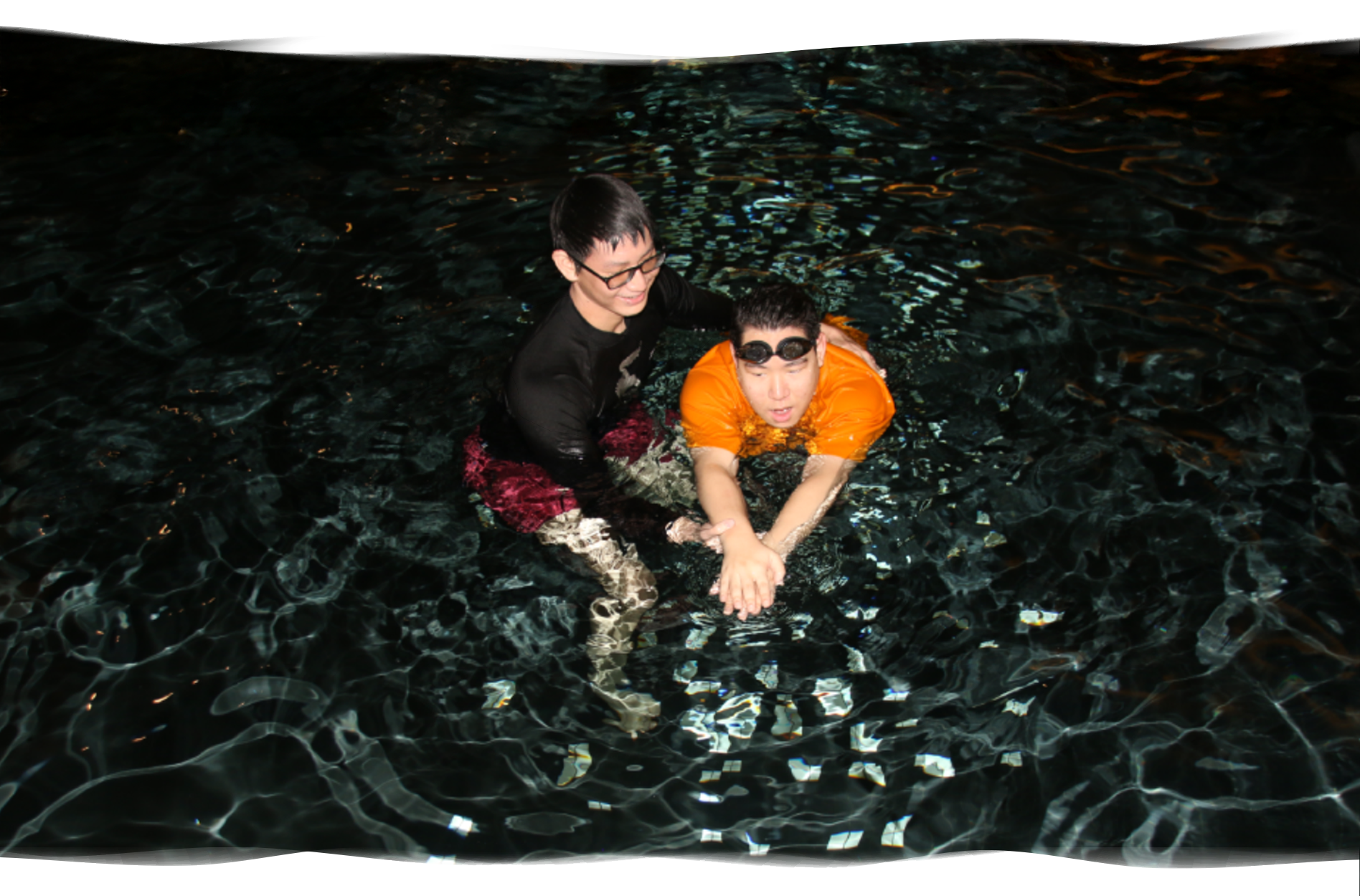 Adult student being gently supported by a Nereids swim teacher during a water confidence one-on-one swimming lesson.