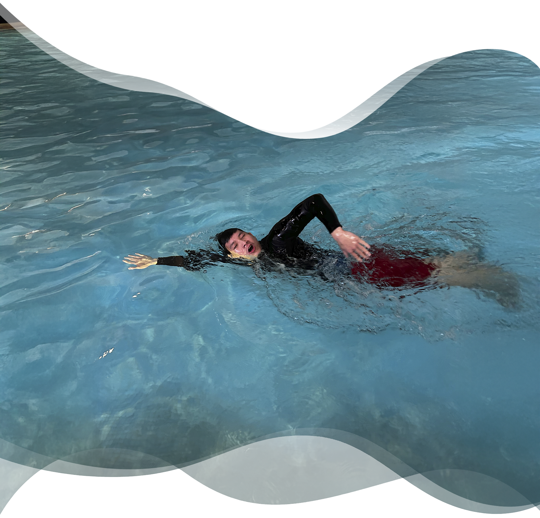 Nereids swim teacher practicing freestyle stroke with side breath in lap pool